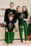 Negro y verde conjunto de pijama familiar navideño con estampado de dinosaurio.