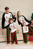 Blanco y Negro conjunto de pijama familiar con estampado de reno navideño.