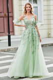 Vestido de fiesta de tul verde con mangas extraíbles con apliques