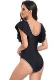 Traje de baño negro de una pieza con cuello en V profundo y control de abdomen con manga con volantes