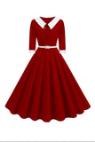 Vestido midi negro de manga corta con escote en V y línea A de la década de 1950