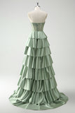 Vestido largo de baile con corsé de cuentas y cuentas de princesa en color burdeos con abertura