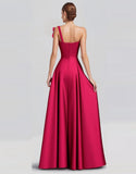 Vestido formal largo de satén con lazo de un hombro fucsia