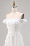 Vestido de novia boho de encaje blanco con hombros descubiertos