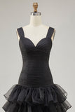 Vestido formal alto y bajo de organza negra de línea A con abertura de volantes