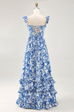 Vestido de invitada de boda azul con volantes estampado con hombros descubiertos y abertura