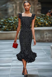 Vestido sirena negro blanco de lunares con volantes
