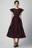 Vestido de lunares rojos con mangas con volantes
