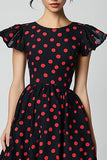 Vestido de lunares rojos con mangas con volantes