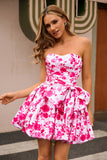 Vestido de fiesta corto floral fucsia sin tirantes con lazo