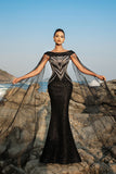 Vestido de noche sirena negro con mangas de capa de lentejuelas brillantes
