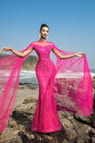 Vestido de noche sirena de lentejuelas fucsias con mangas capa