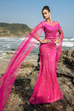 Vestido de noche sirena de lentejuelas fucsias con mangas capa