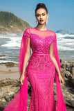 Vestido de noche sirena de lentejuelas fucsias con mangas capa