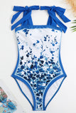 Vintage estampado negro de una pieza conjunto de trajes de baño con falda de playa