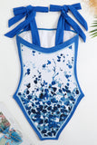 Vintage estampado negro de una pieza conjunto de trajes de baño con falda de playa