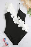 Traje de baño negro de cintura alta de una pieza con flor