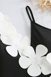 Traje de baño negro de cintura alta de una pieza con flor