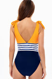 Traje de baño amarillo de una pieza con lazos