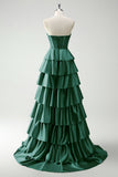 Vestido largo de baile con corsé de cuentas y cuentas de princesa en color burdeos con abertura