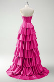 Vestido largo de baile con corsé de cuentas y cuentas de princesa en color burdeos con abertura