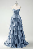 Vestido largo de baile con corsé de cuentas y cuentas de princesa en color burdeos con abertura