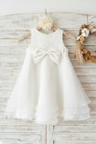 Vestido de niña de las flores de organza blanca con lazo