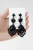 Elegantes pendientes geométricos negros estilo gota para fiesta