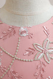 Vestido de niña en tul rubor con lazo de abalorios
