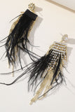 Pendientes largos de diamantes de imitación de plumas de borla