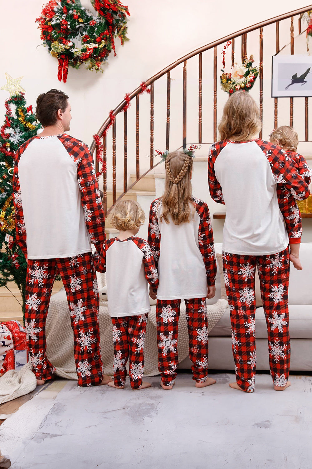Pijama navideño familiar a juego a cuadros con copo de nieve