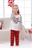 Pijama a cuadros navideños a juego con estampado familiar
