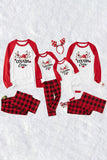 Pijama a cuadros navideños a juego con estampado familiar