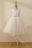 Vestido champán de encaje y tul para niña