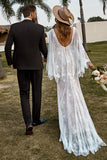 Vestido de novia Boho de encaje marfil y champán con capa